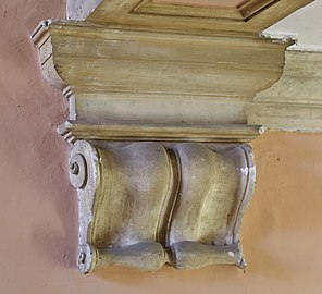 Doric capital in the staircase.
