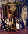 Tafelrunde König Friedrich II. in Sanssouci mit Voltaire (links) und den führenden Köpfen der Berliner Akademie
