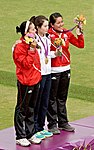 Siegerehrung im Einzel der Frauen 2012: Links Aída Román (Silber), rechts Mariana Avitia (Bronze). In der Mitte die Olympiasiegerin Ki Bo-bae aus Südkorea