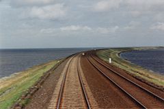 The Hindenburgdamm Rail Causeway across the Wadden Sea to the island of Sylt in Schleswig-Holstein, Germany