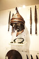Phrygian helmet with large cheekpieces.