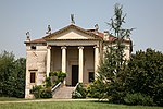 A villa with columns in front