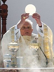 Pope Benedict XVI elevating the Host