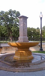 Fountain with a carved pillar in the center