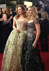 Andrea Riseborough and Madonna in gowns