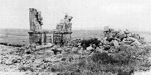 Photograph showing the fragmentary ruins of the triumphal arch in 1887