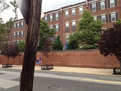 The Naval Square gated neighborhood behind wall on Grays Ferry Avenue
