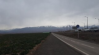 A view of Binalud Mountain Range from near the Hakim Hospital of Neyshabur (February 2019)