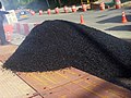 Pile of asphalt-covered aggregate for formation into asphalt concrete