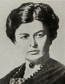black-and-white photograph of a white woman, Grace Gassette, from a 1918 publication.