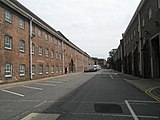 Double Ropery (left, 1771-5) and associated storehouses (right, 1771–81). Between them is Anchor Lane, where anchors were formerly stored in the open air until required.