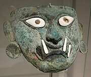 Bronze and shell Moche mask depicting the hero Ai Apaec