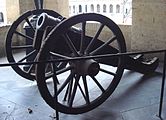 A 6-inch Gribeauval howitzer is located in Les Invalides in Paris, France.