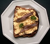 Scotch woodcock, scrambled eggs on toast spread with anchovy (United Kingdom)