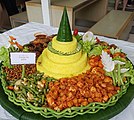 A traditional Javanese tumpeng rice cone, symbolizing "mountain", Indonesia