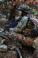 A Georgian soldier with Scouts Platoon, Delta Company, Special Mountain Battalion conducts reconnaissance operations Feb. 14, 2014, during Georgian Mission Rehearsal Exercise (MRE). He is holding Bushmaster M4 in his hand.