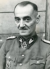 a black and white photograph of Oskar Dirlewanger in Waffen-SS uniform