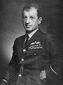 Monochrome studio photograph of Charles Portal in uniform of Air Marshal with wings and cloth medal strips