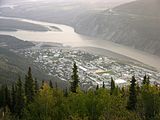 Klondike River (left) flowing into the Yukon River (top and right) at Dawson City