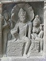 Nagaraja in ardhaparyanka asana, with his wife holding lotus and wearing mangalasutra[212]