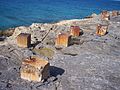 Numerous concrete blocks along the shore of Great Stirrup Cay