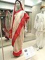 Image 121Red and cream Indian woman's saree, late 1990s (from 1990s in fashion)