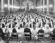 Black-and-white photo of large banquet