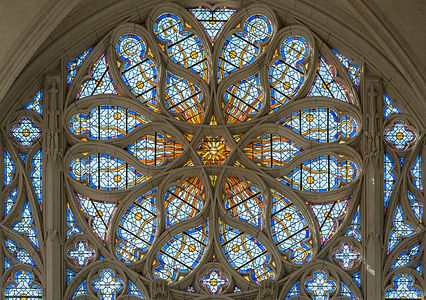 The rose window Sainte-Chapelle de Vincennes. The sinuous lines of the window frame gave the style the name "Flamboyant".