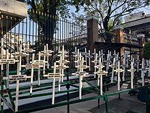 49 crosses with the names of the children killed during the fire.