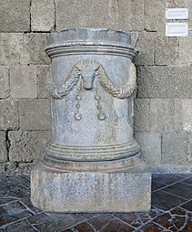 Ancient Greek bucrania on a cylindrical funerary altar, 2nd-1st centuries BC, Lartian stone, Archaeological Museum of Rhodes, Rhodes, Greece