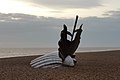 Scallop, viewed from the path between Aldeburgh and Thorpeness, looking back towards Aldeburgh, from which vantage the sculpture takes the shape of two men in a boat, referencing a central incident from the opera Peter Grimes