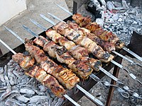 Sturgeon kebabs cooking in Turkmenistan