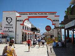 Tourists entering Playa del Carmen's ferry terminal