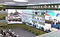 Live briefings from different parts of Russia at the National Defense Management Center