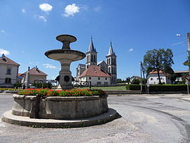 The fountain and church in Boujailles