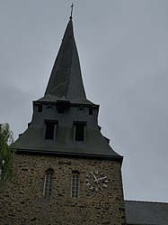 The clock tower of the church, in Meslay-du-Maine