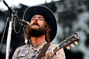 Bridwell playing with Band of Horses in August, 2009