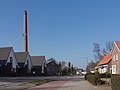 Mill, der Ziegeleischornstein der frühere Holzfabrik