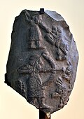 Stele of lion hunt, Uruk, Iraq, 3000-2900 BCE. National Museum of Iraq