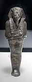 Ushabti of Amenhotep II; 1427–1400 BC; serpentine; 29 × 9 × 0.65 cm, 1.4 kg; British Museum (London)