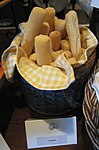 Wide, soft breadsticks in a basket