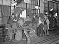 Image 32Union members occupying a General Motors body factory during the Flint Sit-Down Strike of 1937 which spurred the organization of militant CIO unions in auto industry (from History of Michigan)