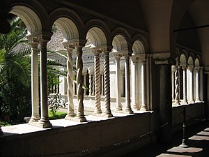 Cosmatesque style in action: twisted columns and mosaics at the cloister in San Giovanni in Laterano, Rome.