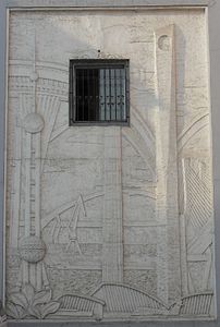 Stucco mural depicting the original design.