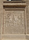 Roman Emperor Trajan brings offerings to Hathor and Ra-Harakhte, Dendera.