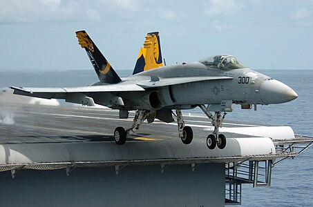 [[F/A-18C Hornet[[ launching from the USS Kitty Hawk