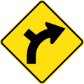 (W2-9) Side road intersection from left on a curve to right