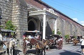 Kalesa parked in front of Vigan Cathedral