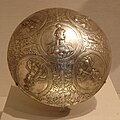 The Persian lady portrayed in five medallions on this bowl has a hairstyle that suggests that she may have been a queen in the Sassanid royal family at the time of King Narseh.