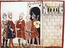 Two bearded men, each wearing a crown standing at the gate of a walled town.